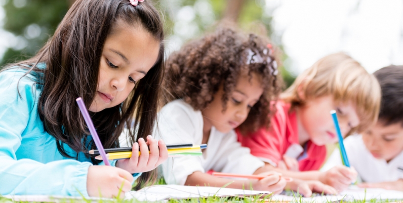 Billboard Contest Group of children coloring at a park