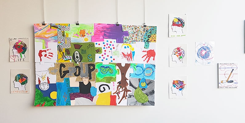 May 2018: Neuro Arts Collective various art works done in different media on a wall