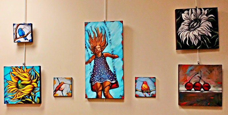 Gallery Stoney Creek: Michelle Guitard oil paintings on a wall