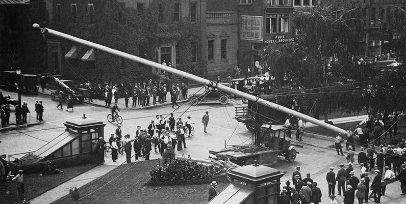 Special Exhibits: Out of the Vaults archival photo of a flagpole being raised in Gore Park