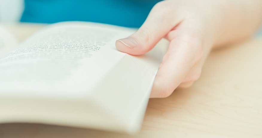 Book Clubs Closeup of a woman holding a book
