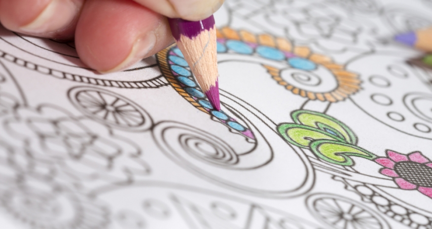 Colouring for Adults a close up of a hand colouring