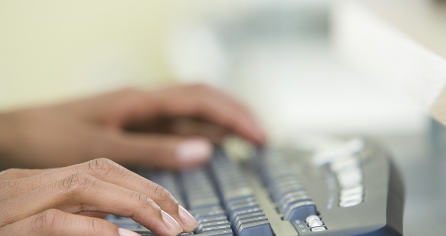 Computer Classes Closeup of hands on a keyboard