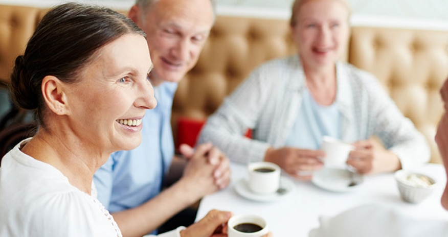 Memory Cafe group of seniors having coffee