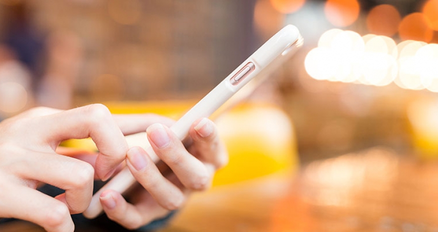Appy Hour woman using mobile phone
