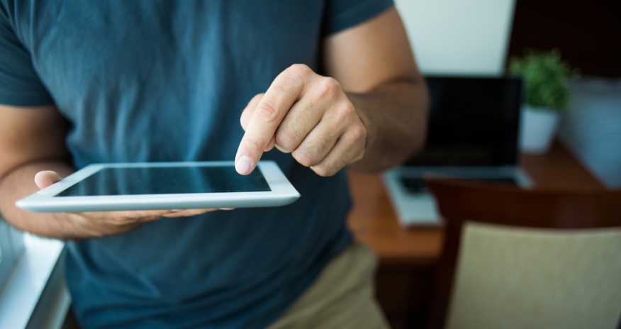 iPad 101 Closeup of a man using an iPad