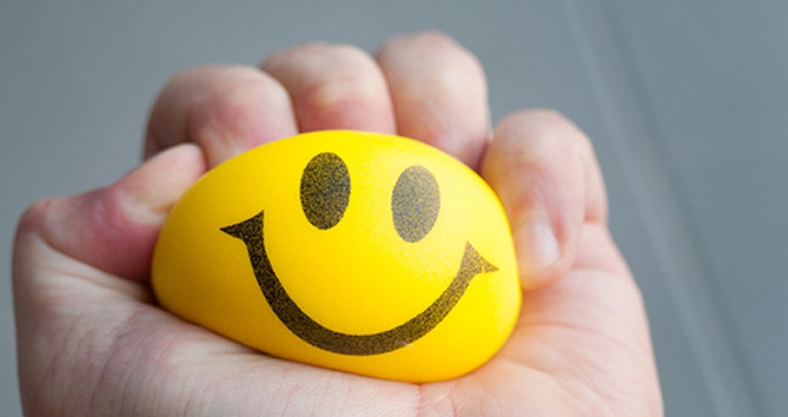 Stress Friend or Foe stress ball being squeezed