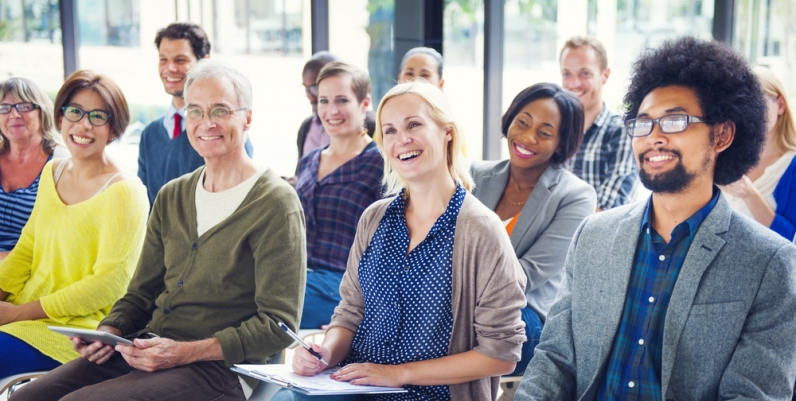 General Interest Programs Group of people sitting in an audience