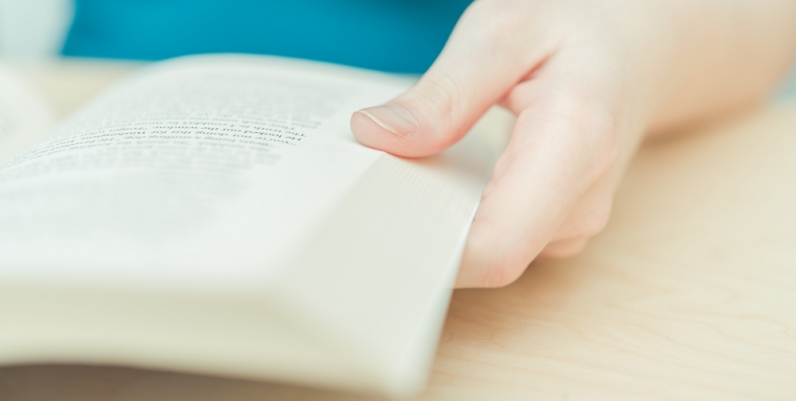 Hamilton Author Series Closeup of a woman holding a book