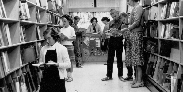 History of the Bookmobile Archival photo of children inside the Bookmobile circa 1950s