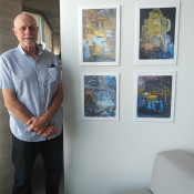 Steve with his art displayed on the 4th floor of Central Library
