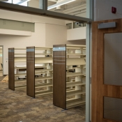 Some empty bookshelves inside the new greensville branch