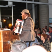 man playing an accordion