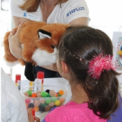 a fix puppet giving a girl a kiss