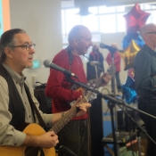 three males performing 