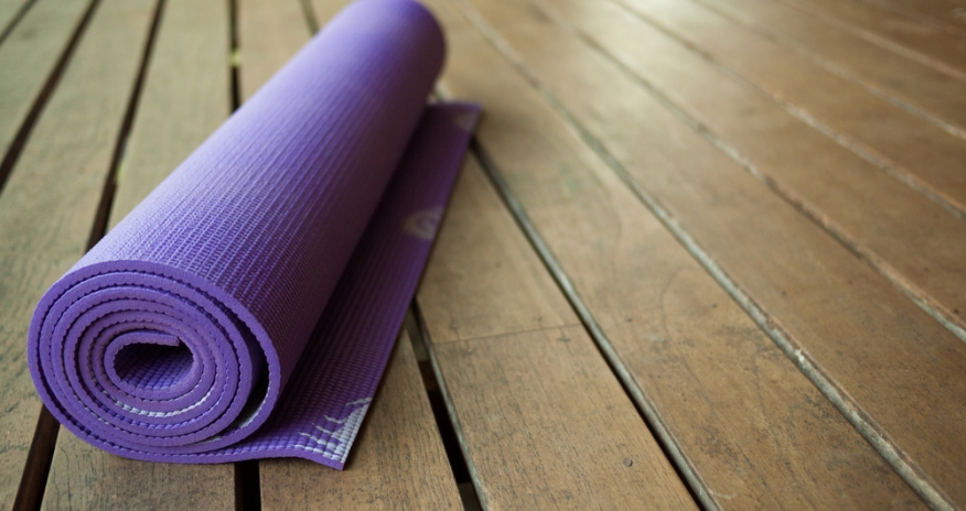 Yoga Yoga mat on a wood floor