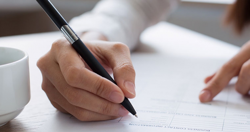 Grants and Fundraising Application woman completing application form